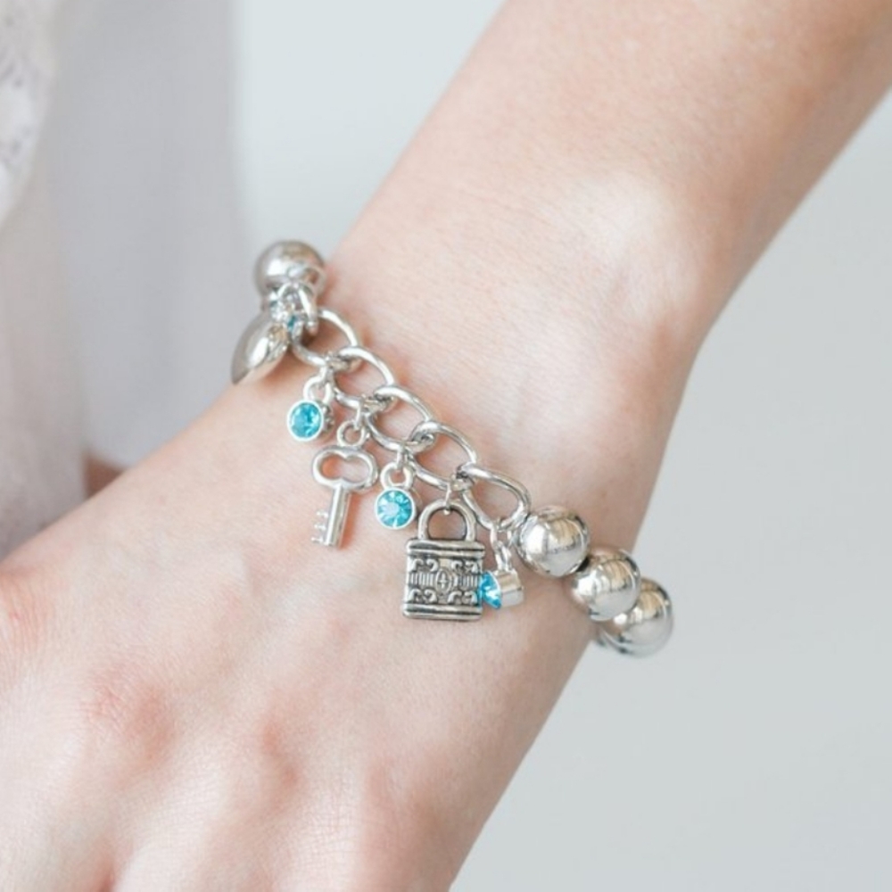"Feelin Flirtatious"Blue Rhinestone Charm Bracelet